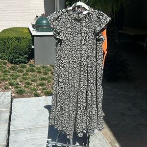 Pinch Dress. Flutter sleeves. Never worn. Size L. Pockets. High low hem.